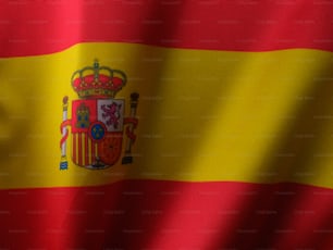 the flag of spain is waving in the wind