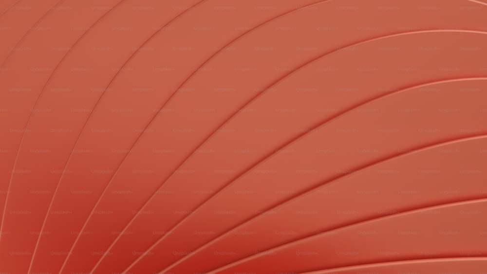 a close up of a red background with wavy lines