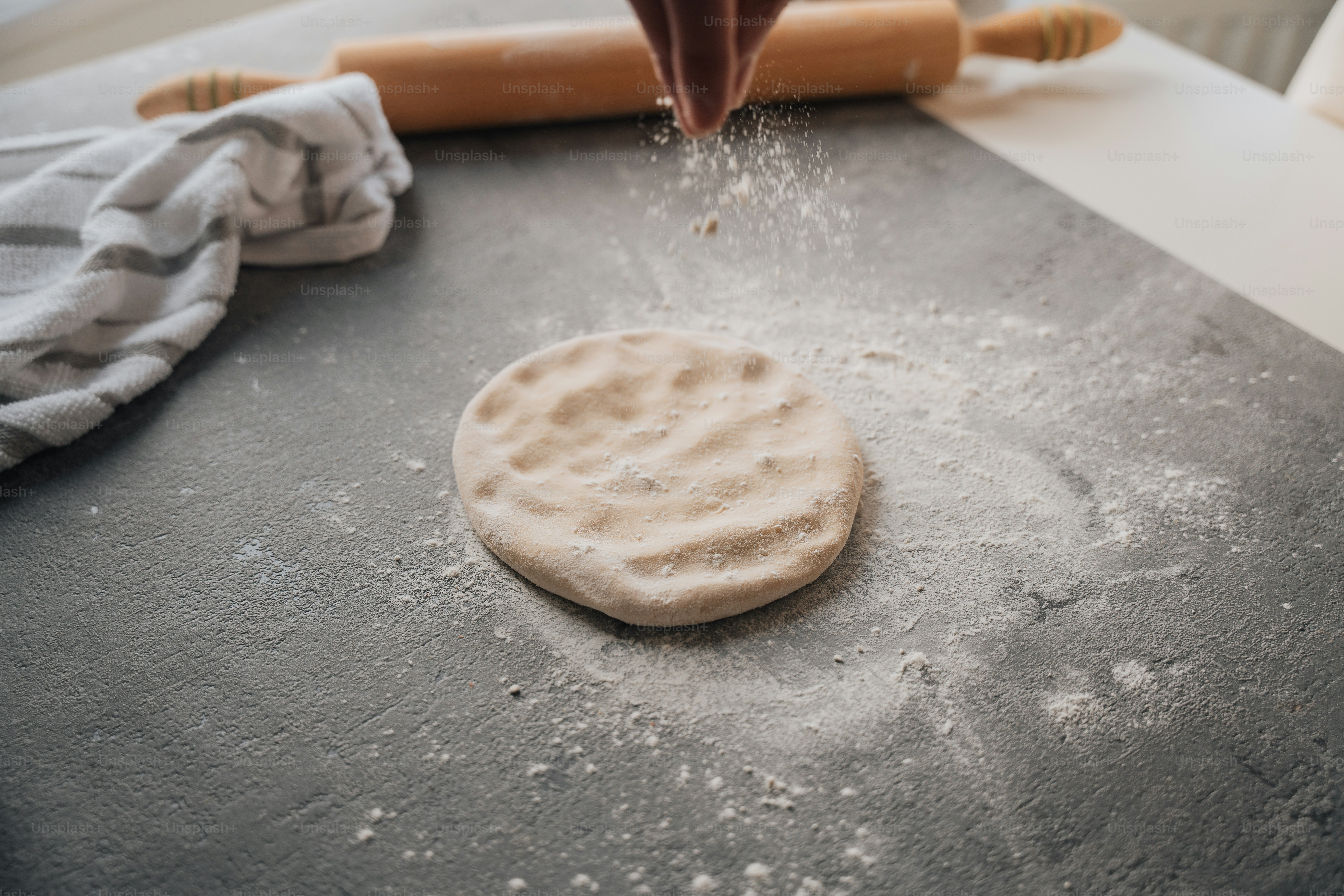 a cookie being made with a rolling pin