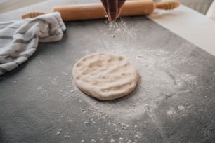 a cookie being made with a rolling pin