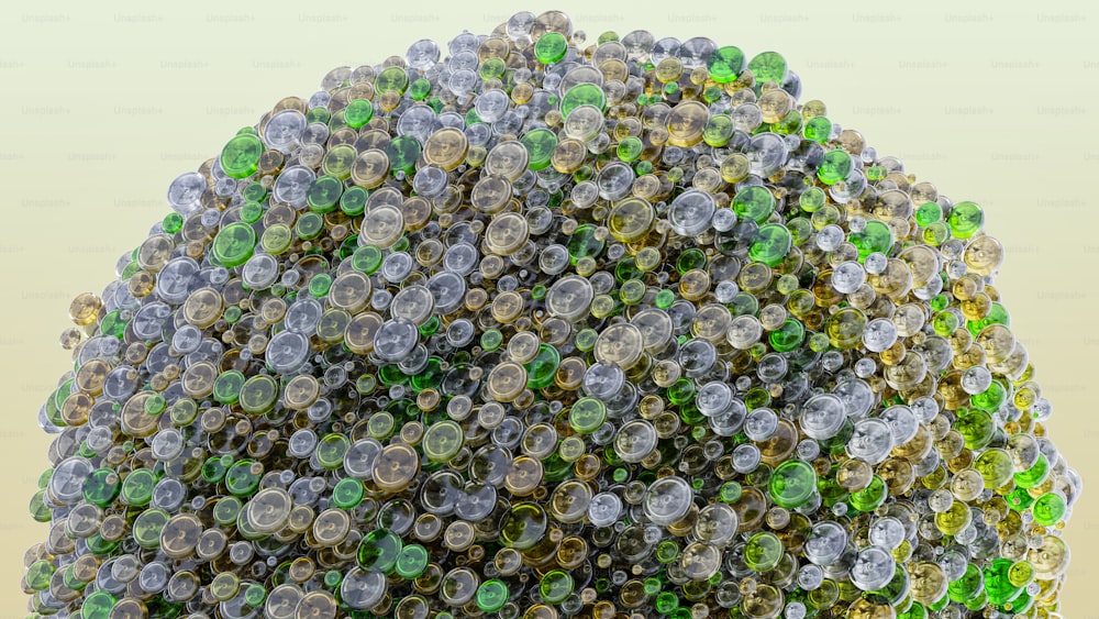 Un mucchio di bolle verdi, gialle e grigie