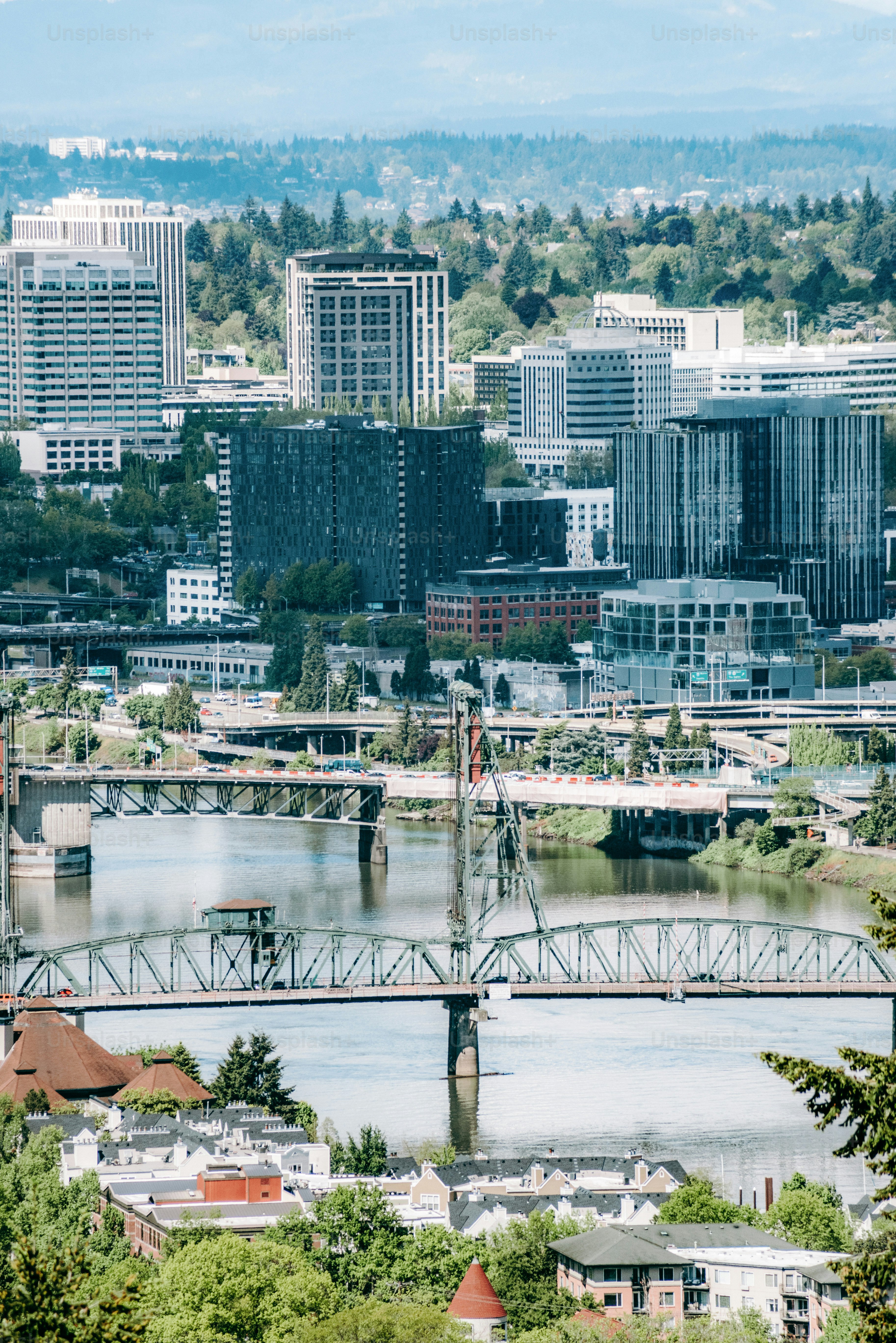 a view of a city with a bridge over a river