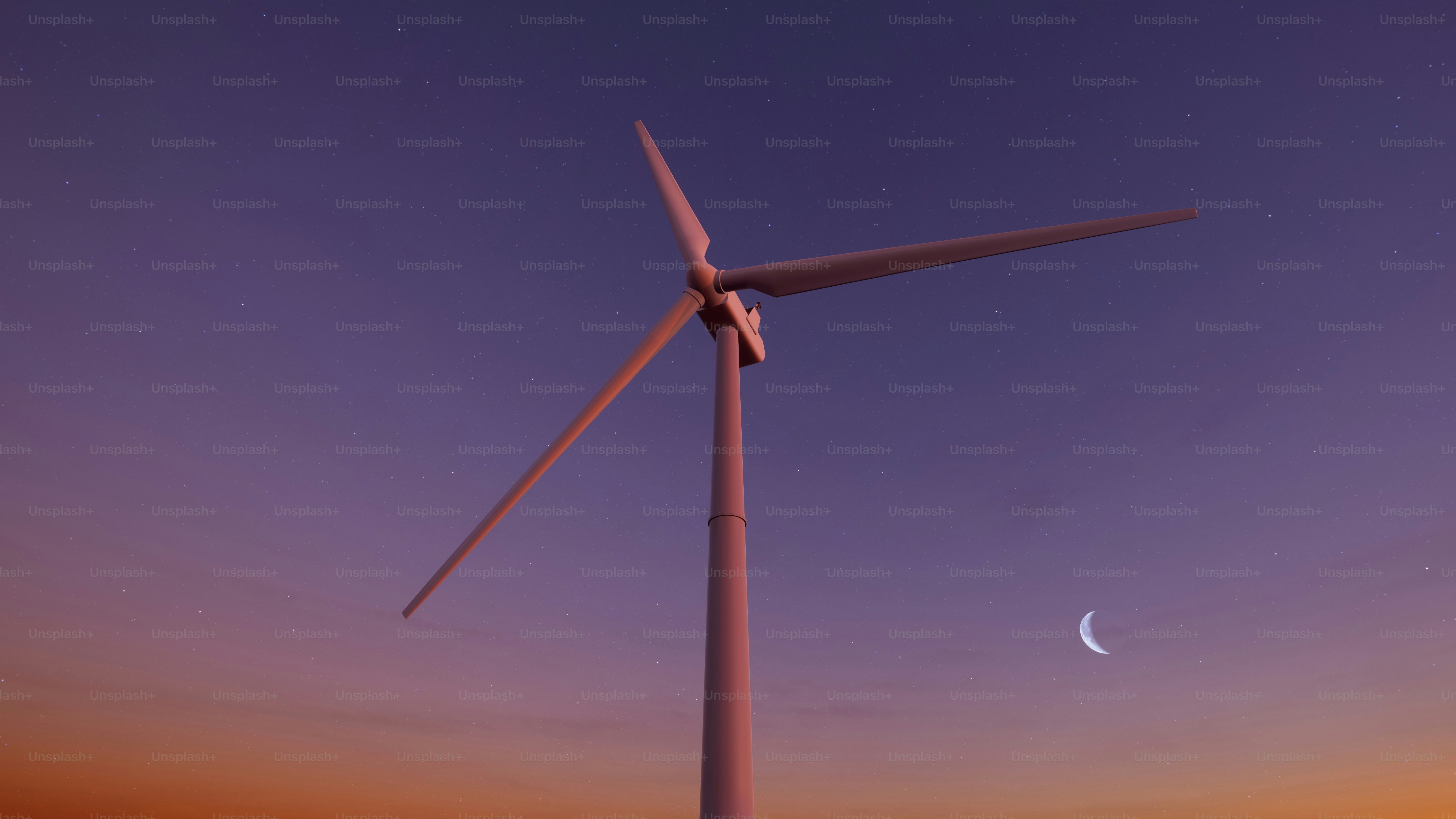 Una turbina eólica con la luna de fondo