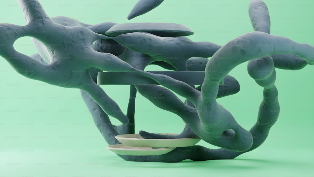 a sculpture made out of clay on a green background