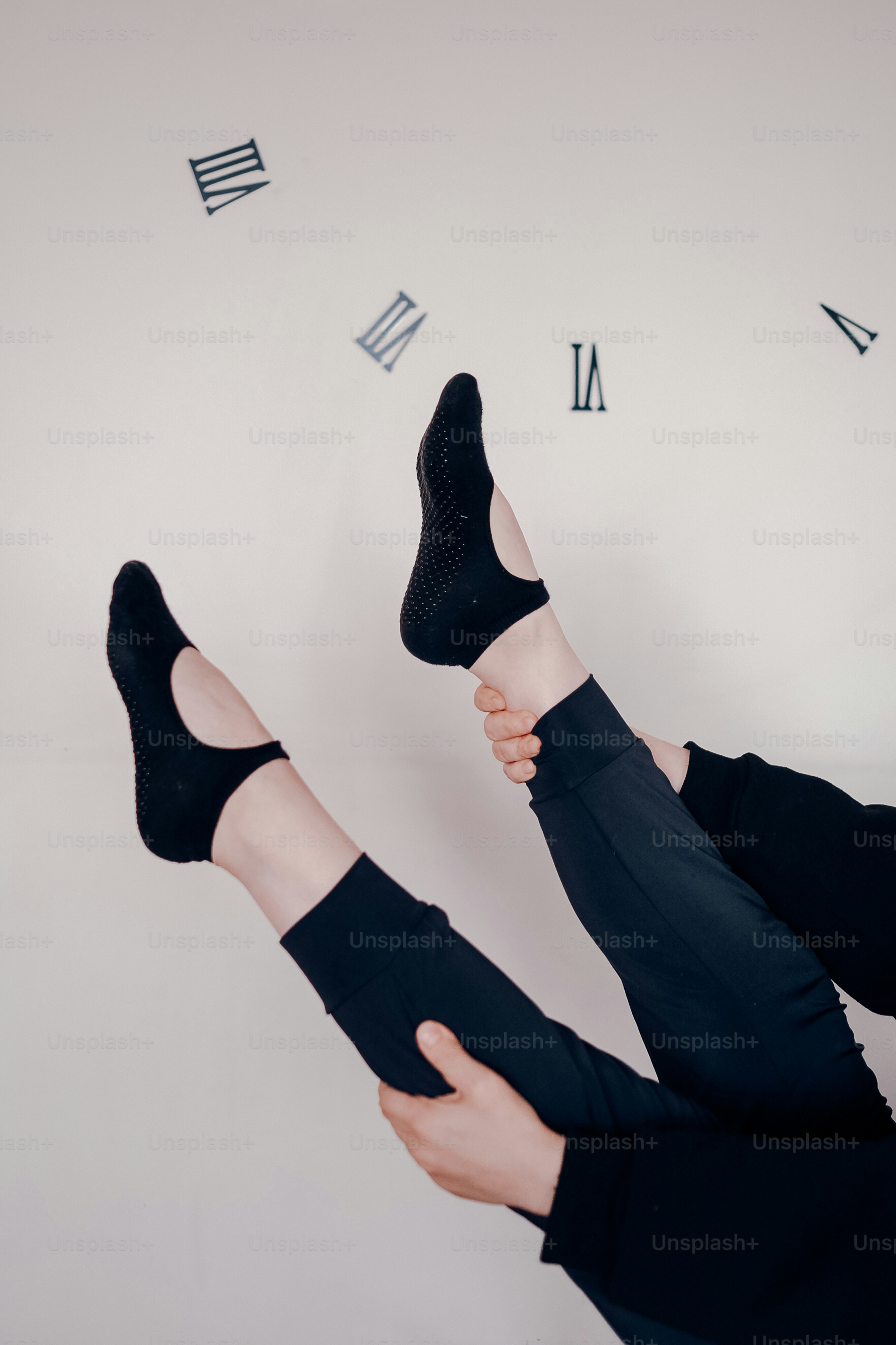 a person with their feet up in the air