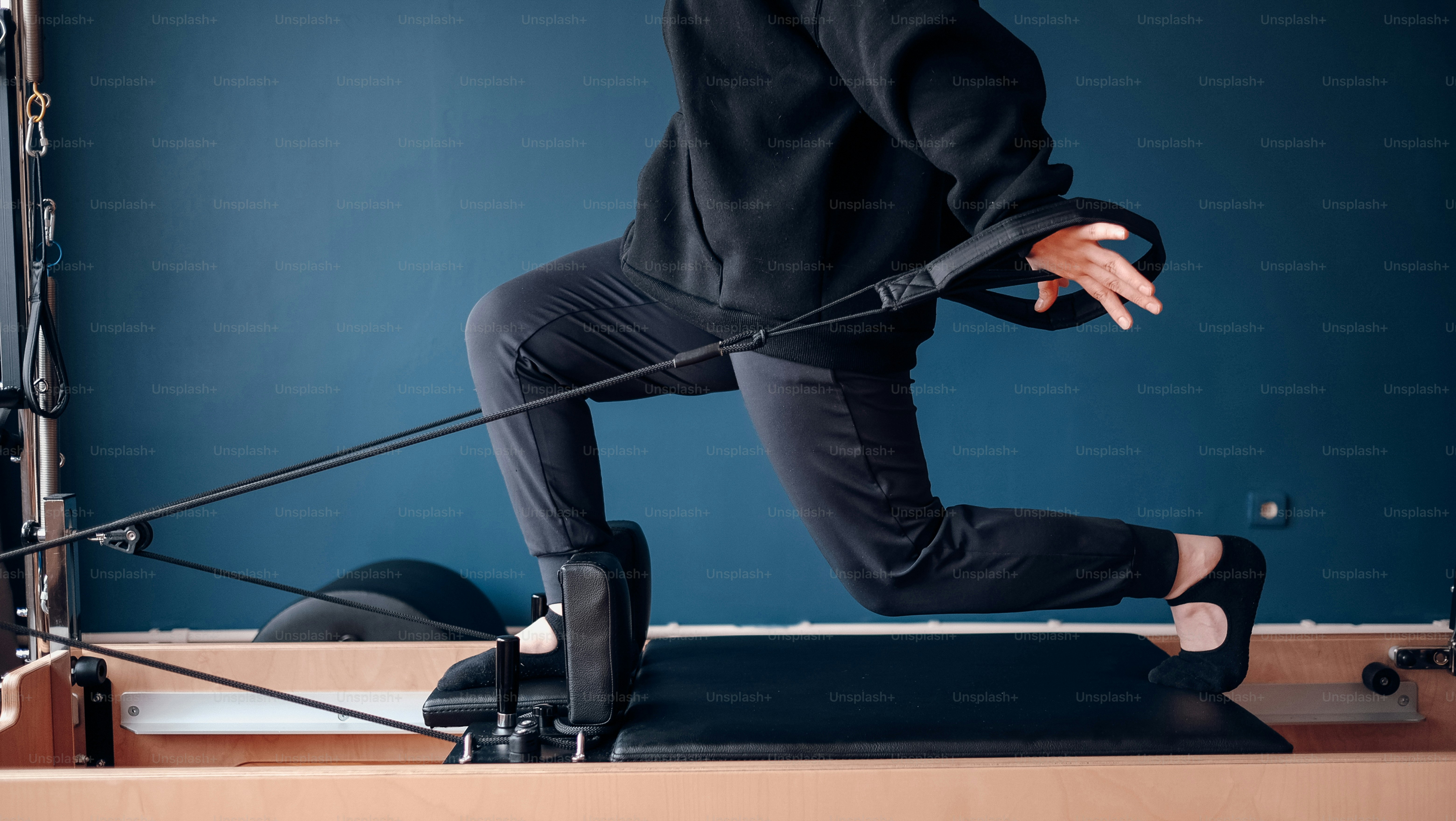 a man is running on a treadmill