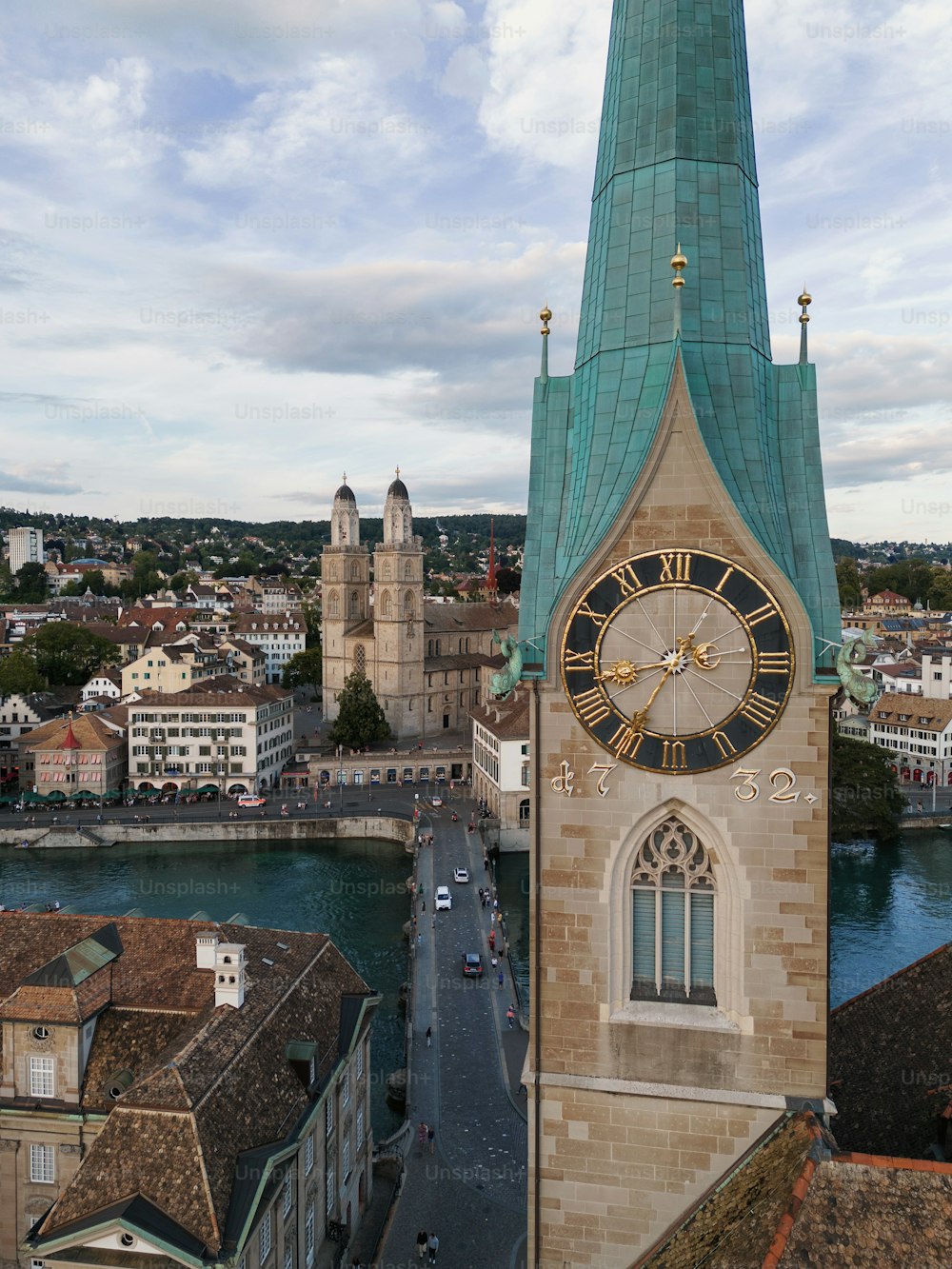 a large clock tower towering over a city