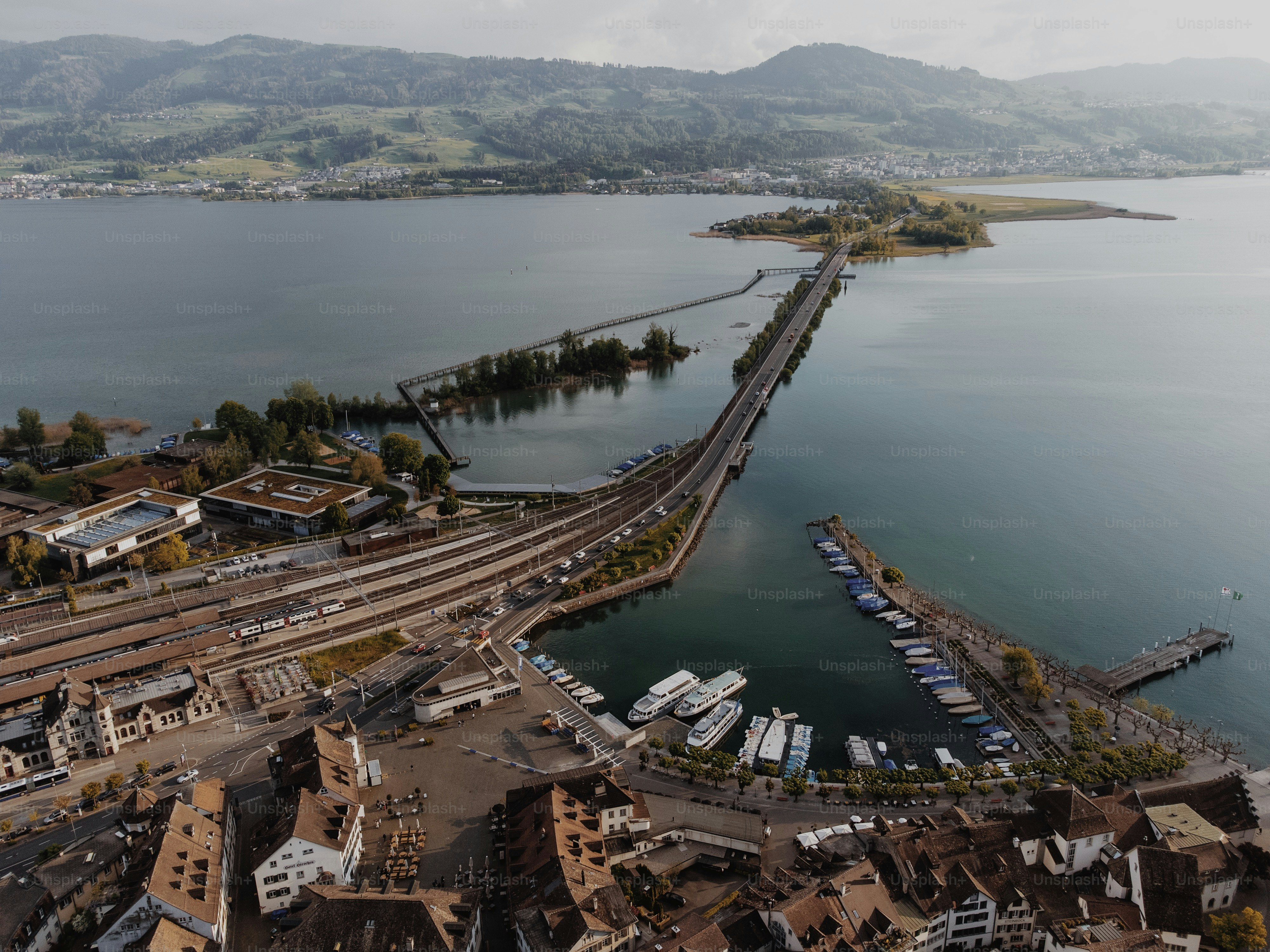 a large body of water with a bridge in the middle of it