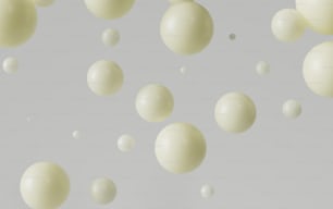 Un grupo de bolas blancas flotando en el aire