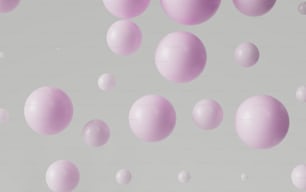 a group of pink balls floating in the air