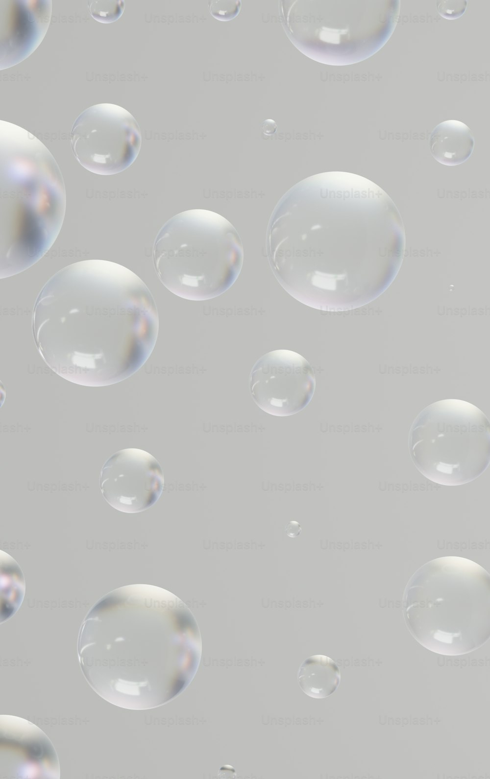 um monte de bolhas de sabão flutuando no ar