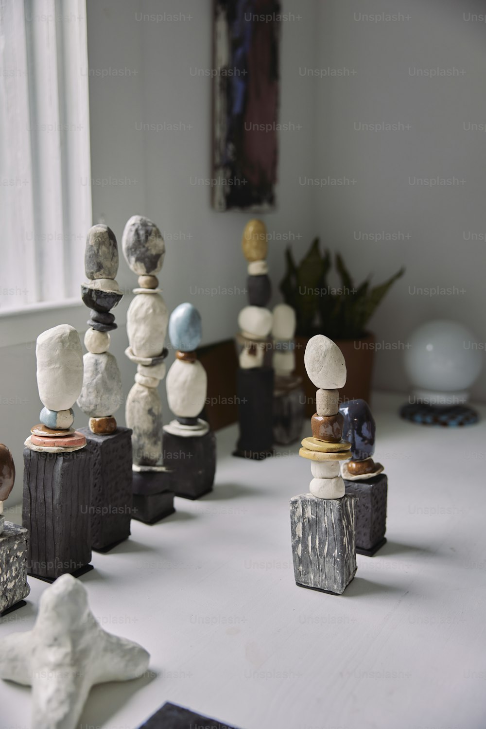 a group of small sculptures sitting on top of a table