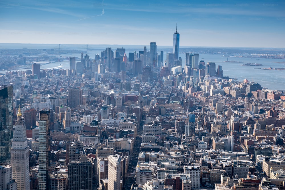 a view of a large city from the top of a building