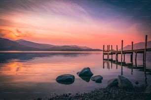 a dock sitting on top of a body of water