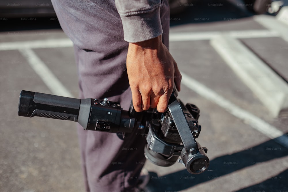 a person holding a camera in their hand