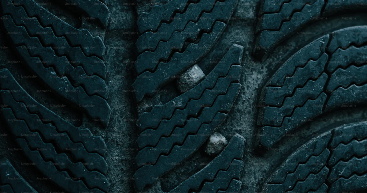 A close up of a tire on a car photo – Rubber texture Image on Unsplash