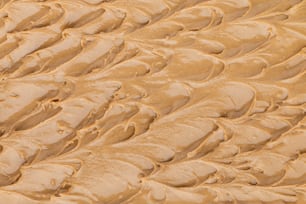 um close up de uma substância semelhante a um deserto