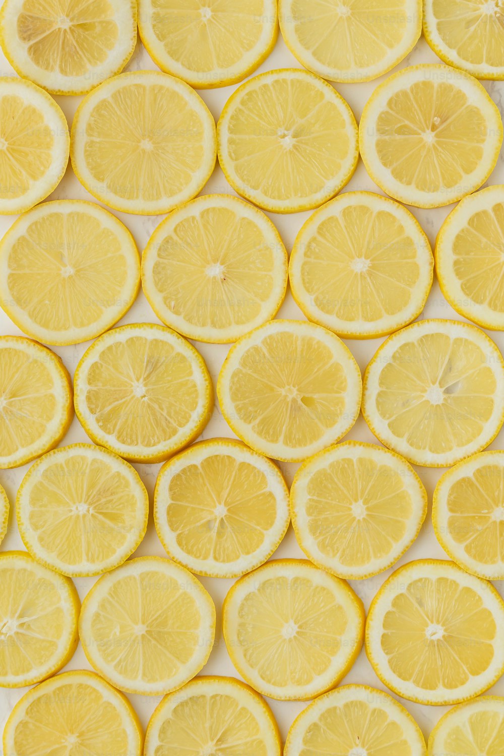 a bunch of lemons that are cut in half