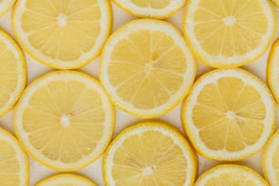 a bunch of lemons that are cut in half