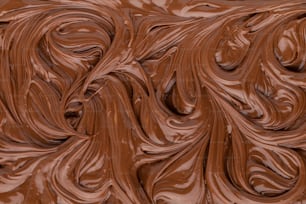 a close up of a chocolate swirl pattern