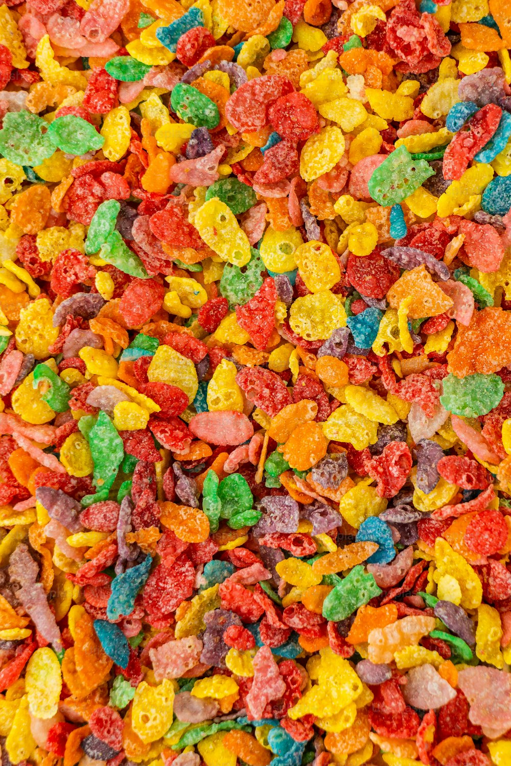 a close up of a mixture of colorful gummy bears