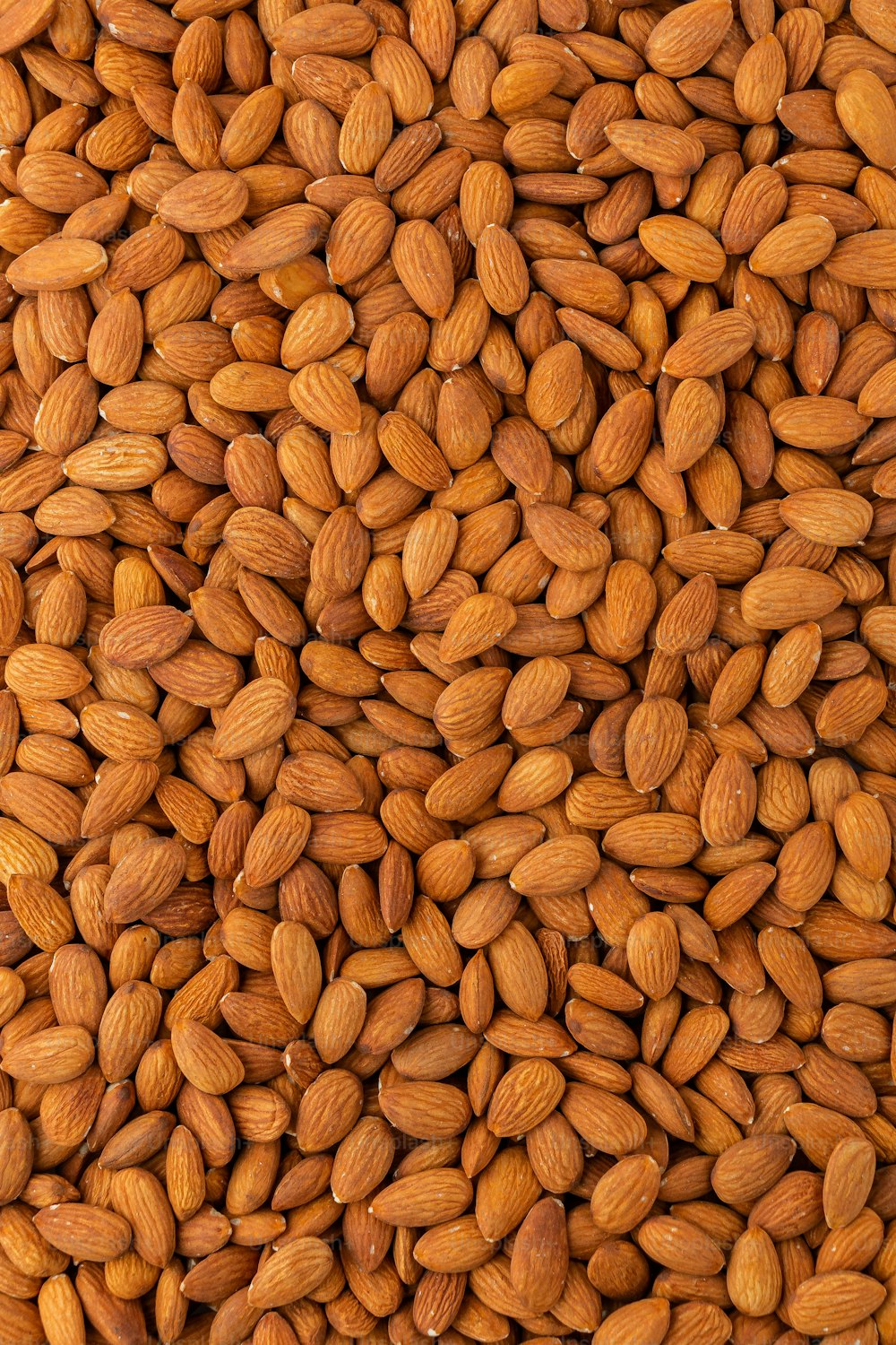 a pile of almonds sitting on top of each other