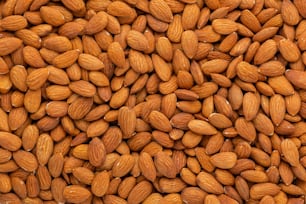 a pile of almonds sitting next to each other