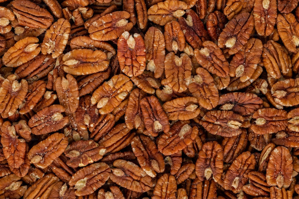 a pile of pecans is shown close up