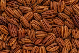 a pile of pecans is shown close up