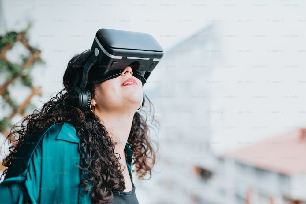 a woman wearing a vr headset looking up into the sky