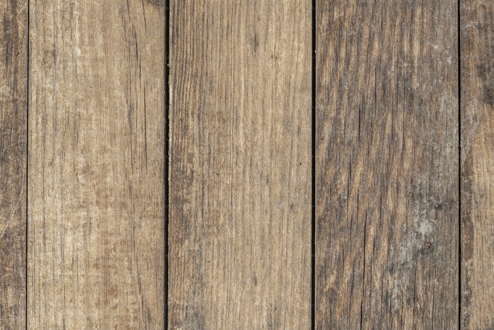 a close up view of a wooden surface