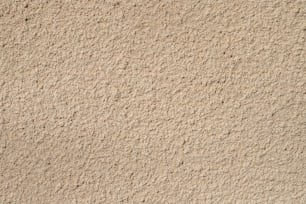 a close up view of a wall made of sand