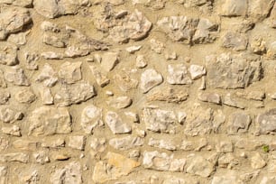 a close up of a wall made of rocks