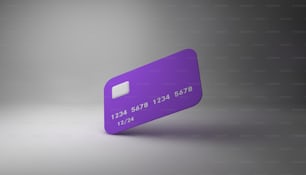 회색 배경에 보라색 신용 카드