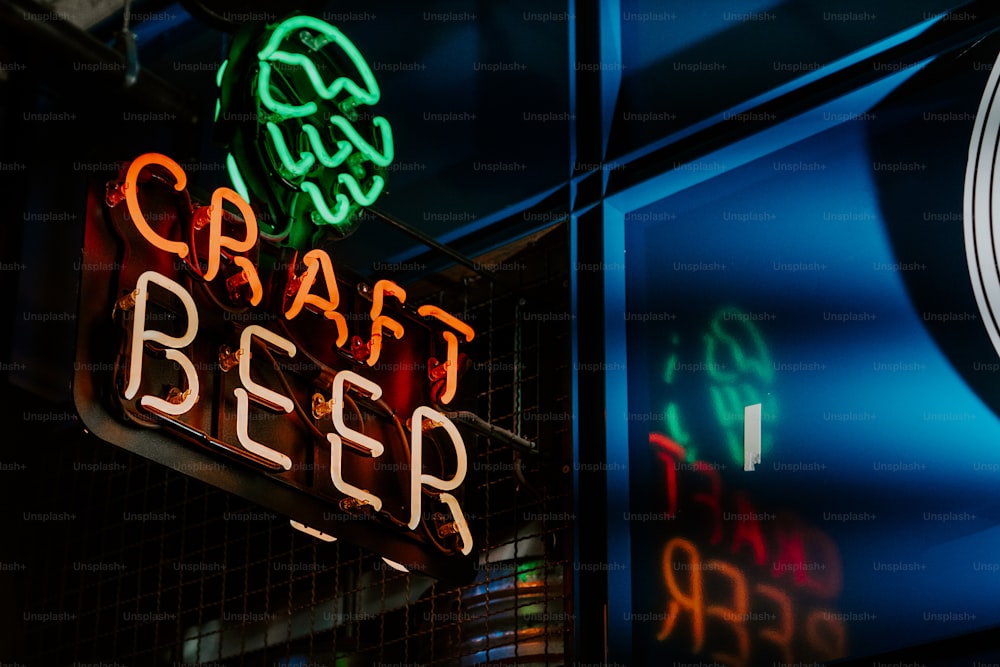 a neon sign that reads craft beer and a clock