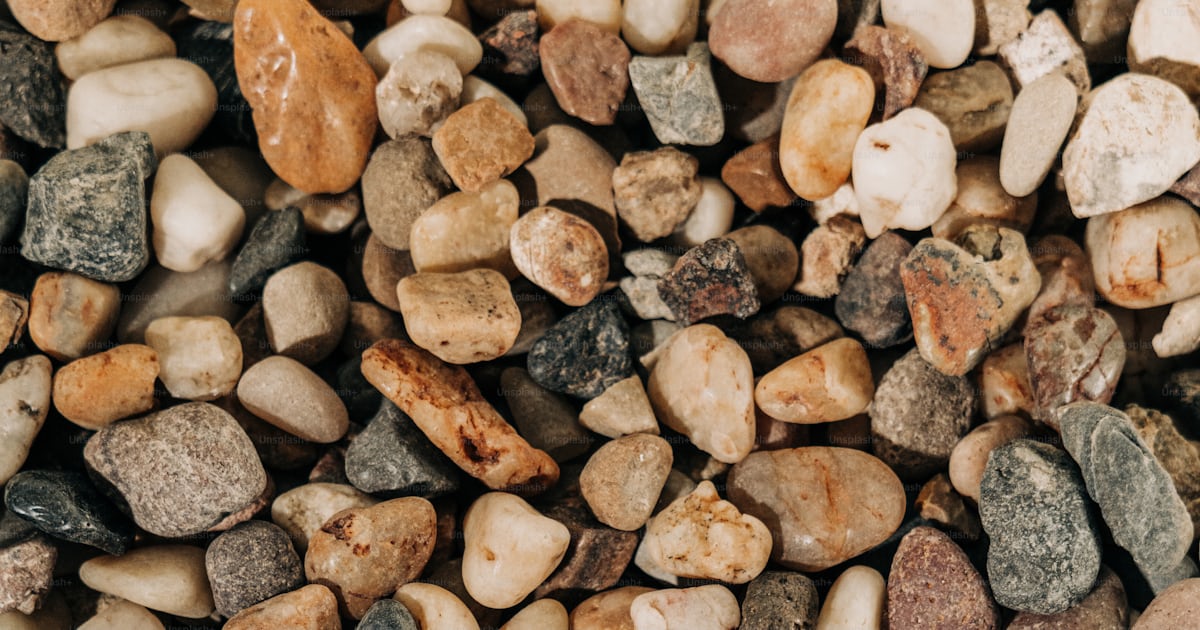 A bunch of rocks that are all together photo – Texture Image on Unsplash