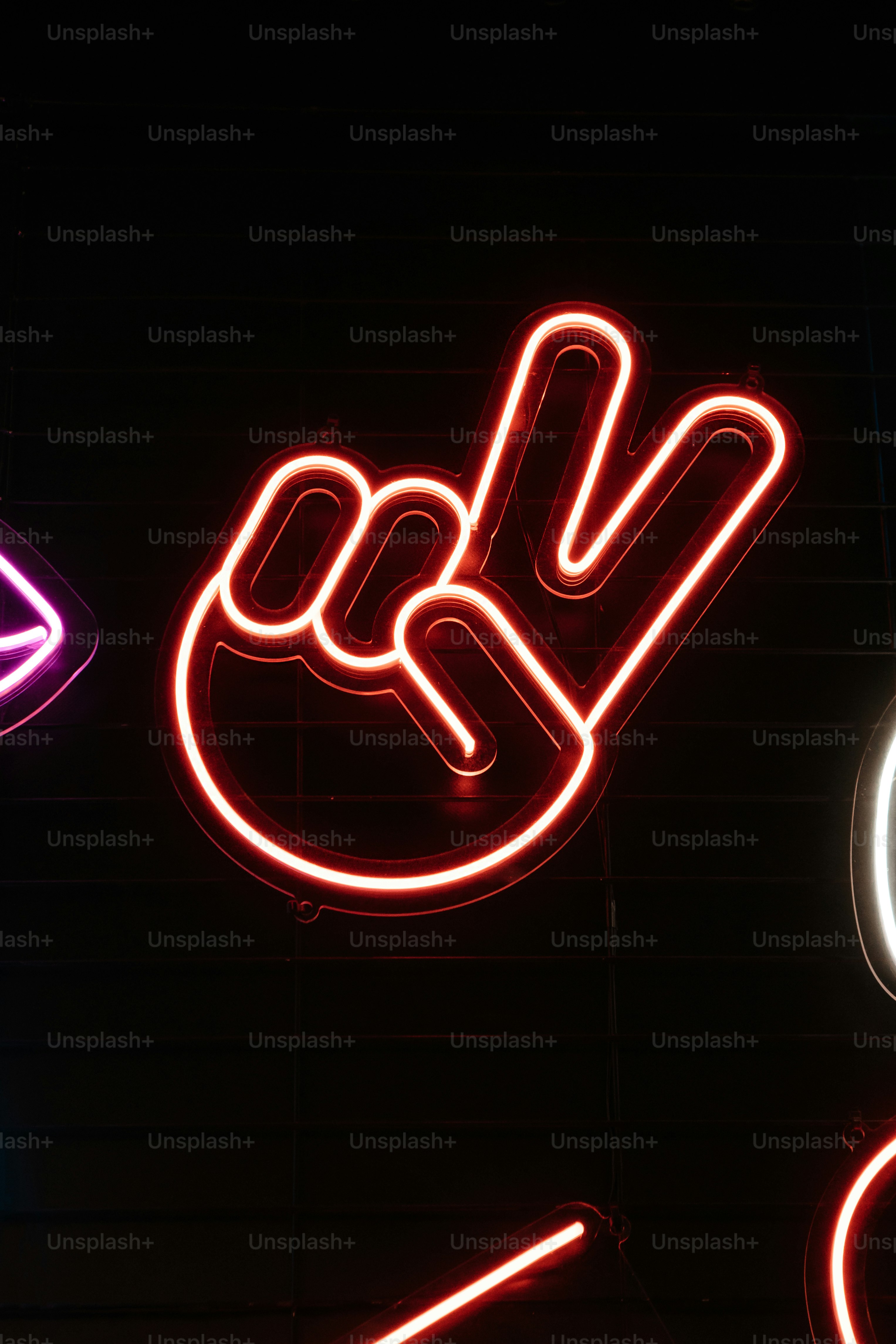 Victory hand emoji neon sign