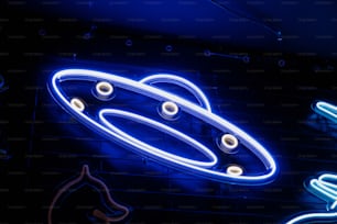 a neon sign that is on the side of a building