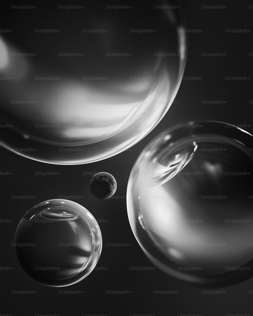 a black and white photo of soap bubbles