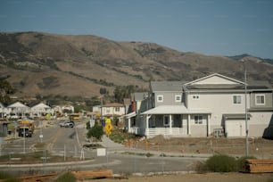 a view of a town with a mountain in the background