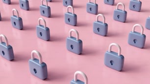 a group of padlocks on a pink surface
