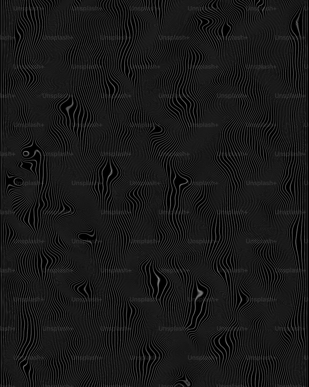 um fundo preto com linhas onduladas