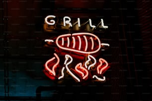 a neon sign that reads grill boss