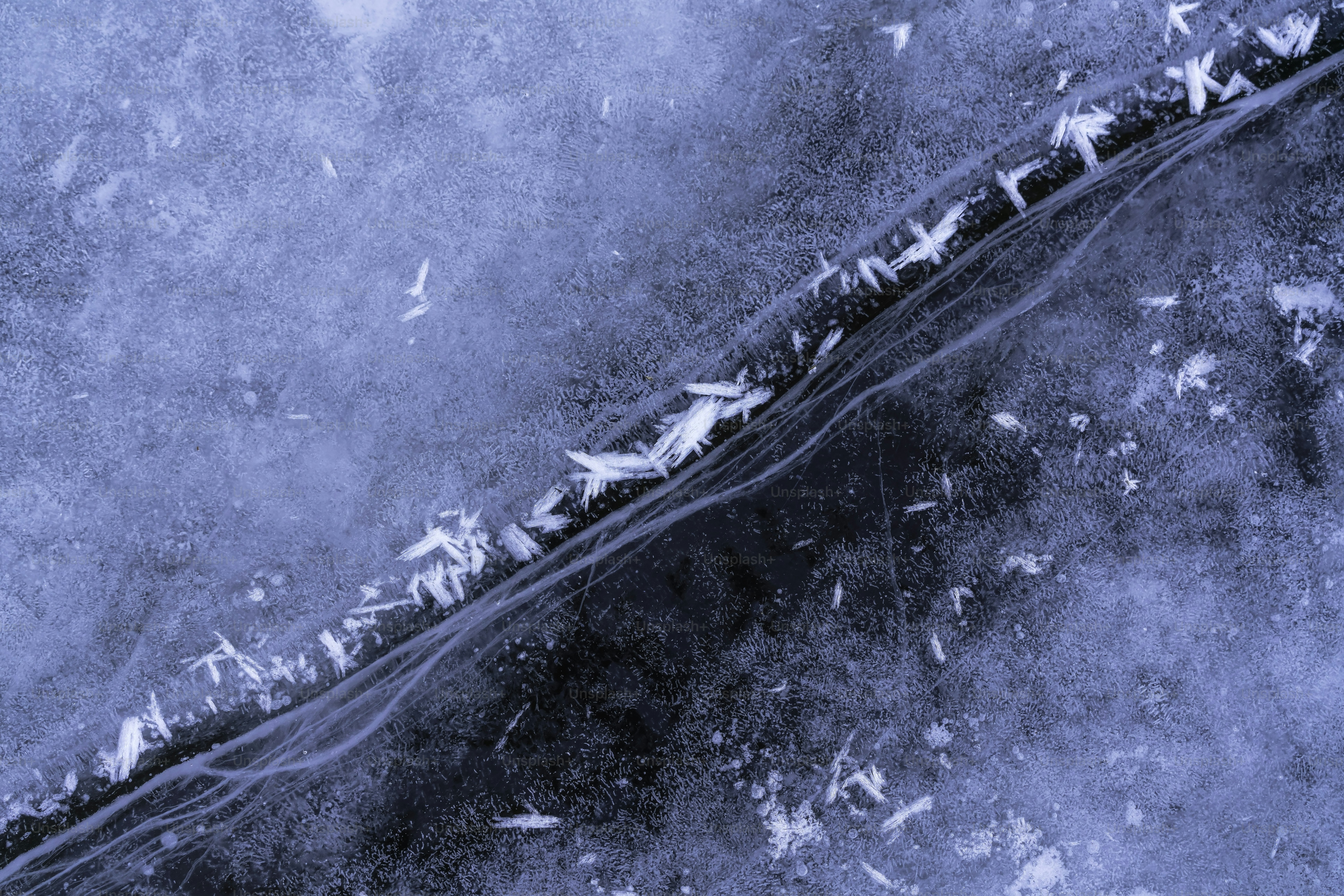 An aerial view of a snow covered road photo – Frost Image on Unsplash