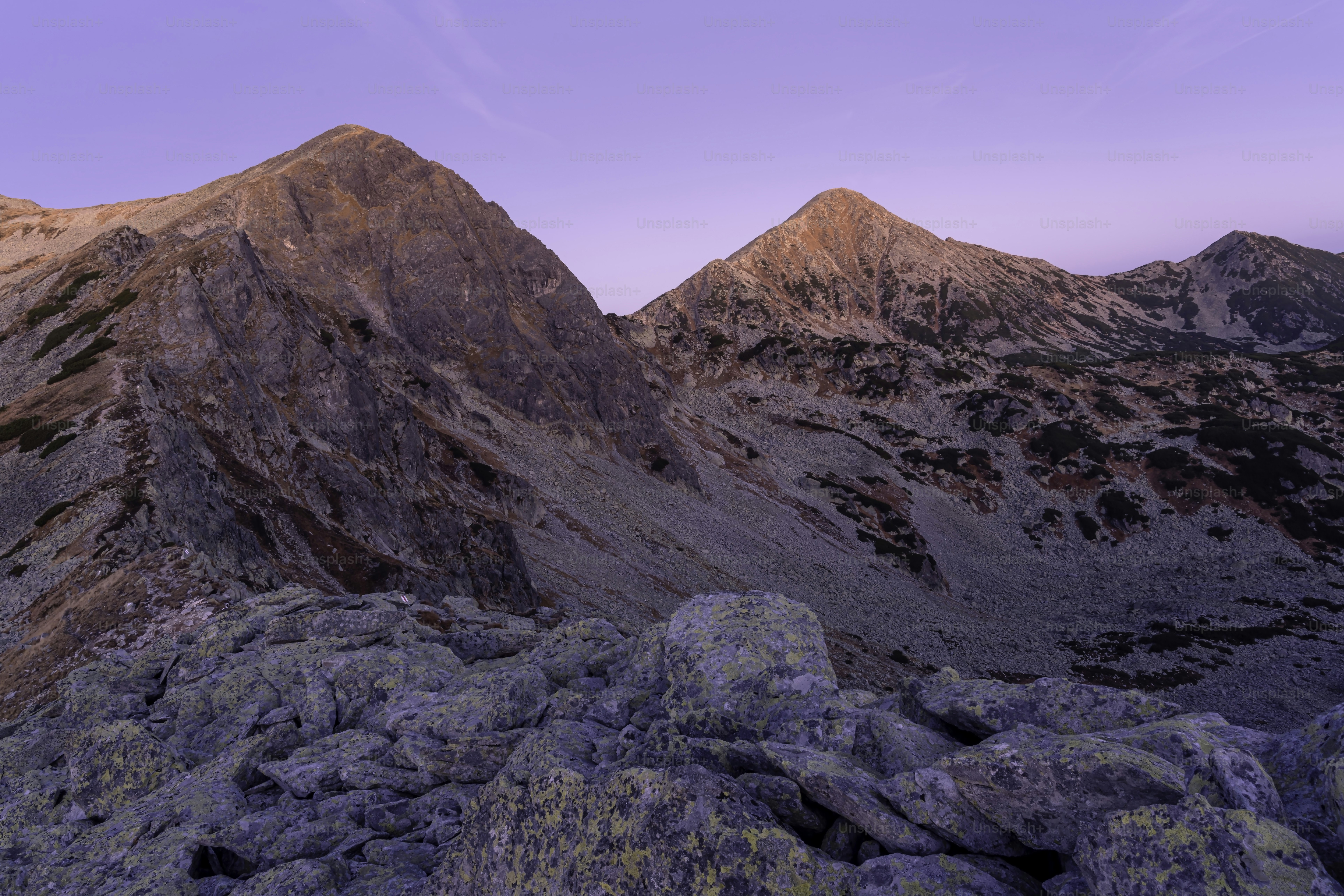 A view of a mountain range at sunset photo – Nature Image on Unsplash