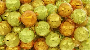 a pile of shiny gold and green balls