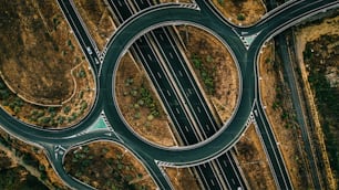 an aerial view of a highway intersection with multiple lanes