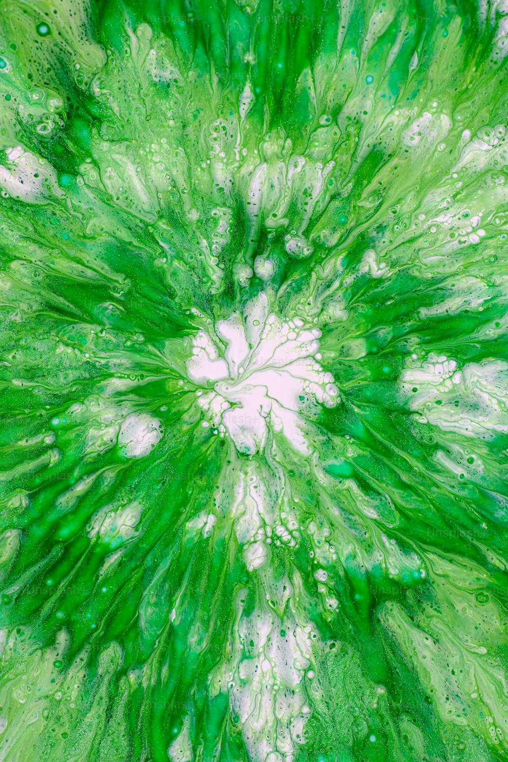 a green and white abstract painting