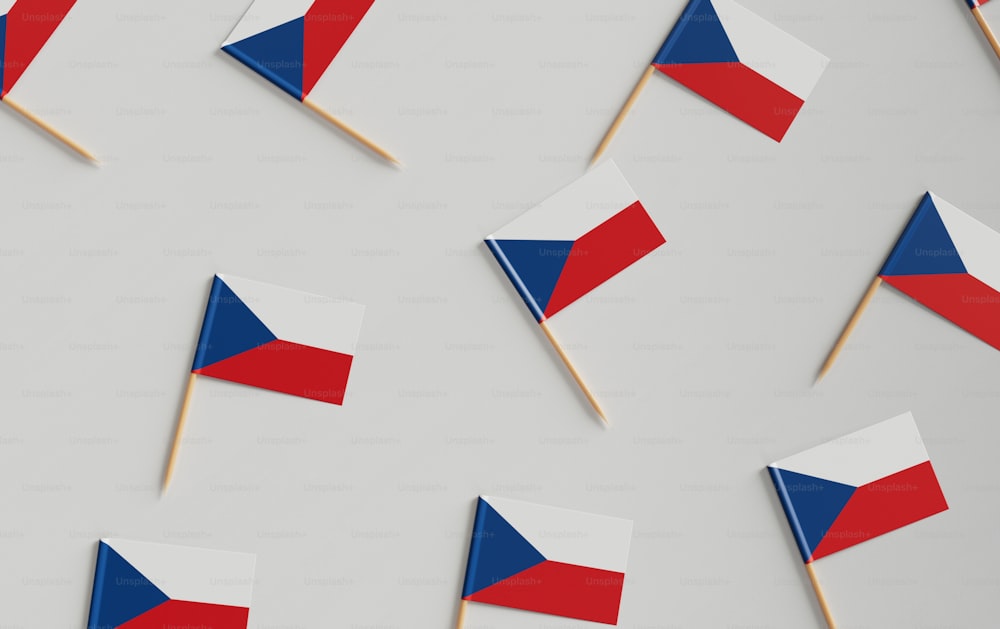 a group of small red, white and blue flags