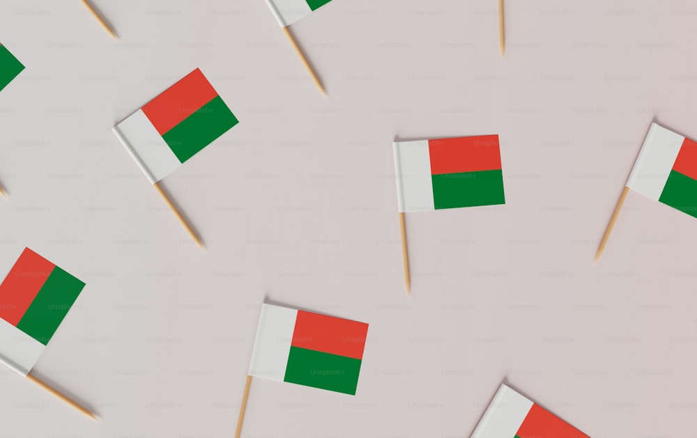 a group of toothpicks with flags on them
